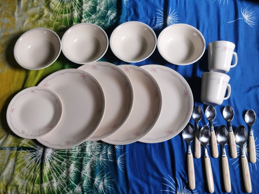 Vintage Corelle by Corning Dinnerware Set in English Breakfast Pattern (Category: Dinnerware & Cutlery) located in Angono. Submitted by chubby_nanay (Listing ID 1459493140, Image 1). Description: Take all or pwede din per piece Mug - ₱300 each Dessert Plate - ₱300 Plate - ₱350 each Spoon - ₱250 each Teaspoon - ₱200 each A set of Corelle English Breakfast dinnerware with a pink floral pattern, including bowls, plates, mugs, and matching flatware. 