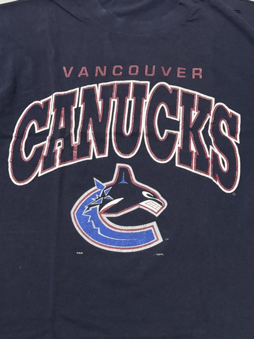 Vintage NHL Vancouver Canucks (Category: Tshirts & Polo Shirts ) located in Las Pinas. Submitted by thrftmnl. (Listing ID 1459538546, Image 3). Description: Vtg NHL Vancouver Canucks Single stitch Size: XL Dimes Width: 23.5 Length: 28 Issue: distressed neck and 2 pinhole .