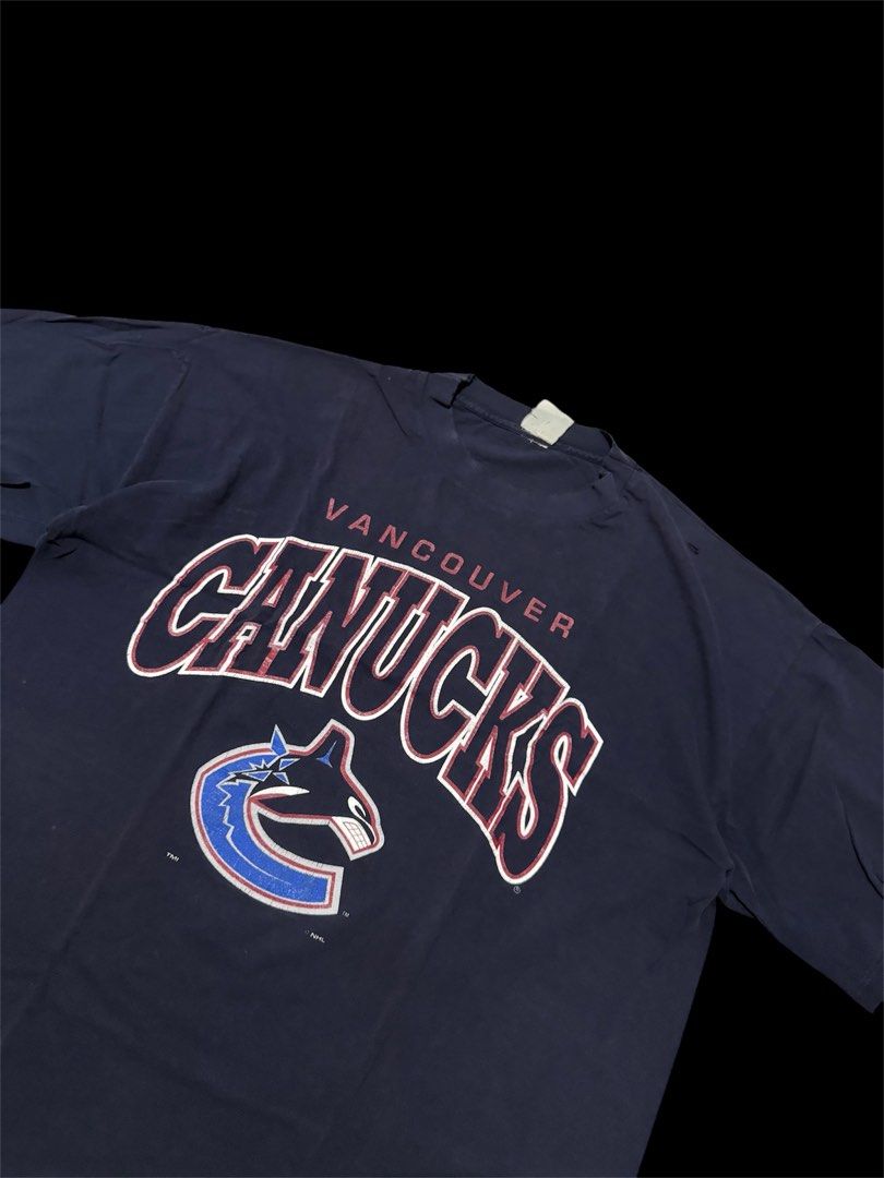 Vintage NHL Vancouver Canucks (Category: Tshirts & Polo Shirts ) located in Las Pinas. Submitted by thrftmnl. (Listing ID 1459538546, Image 2). Description: Vtg NHL Vancouver Canucks Single stitch Size: XL Dimes Width: 23.5 Length: 28 Issue: distressed neck and 2 pinhole .