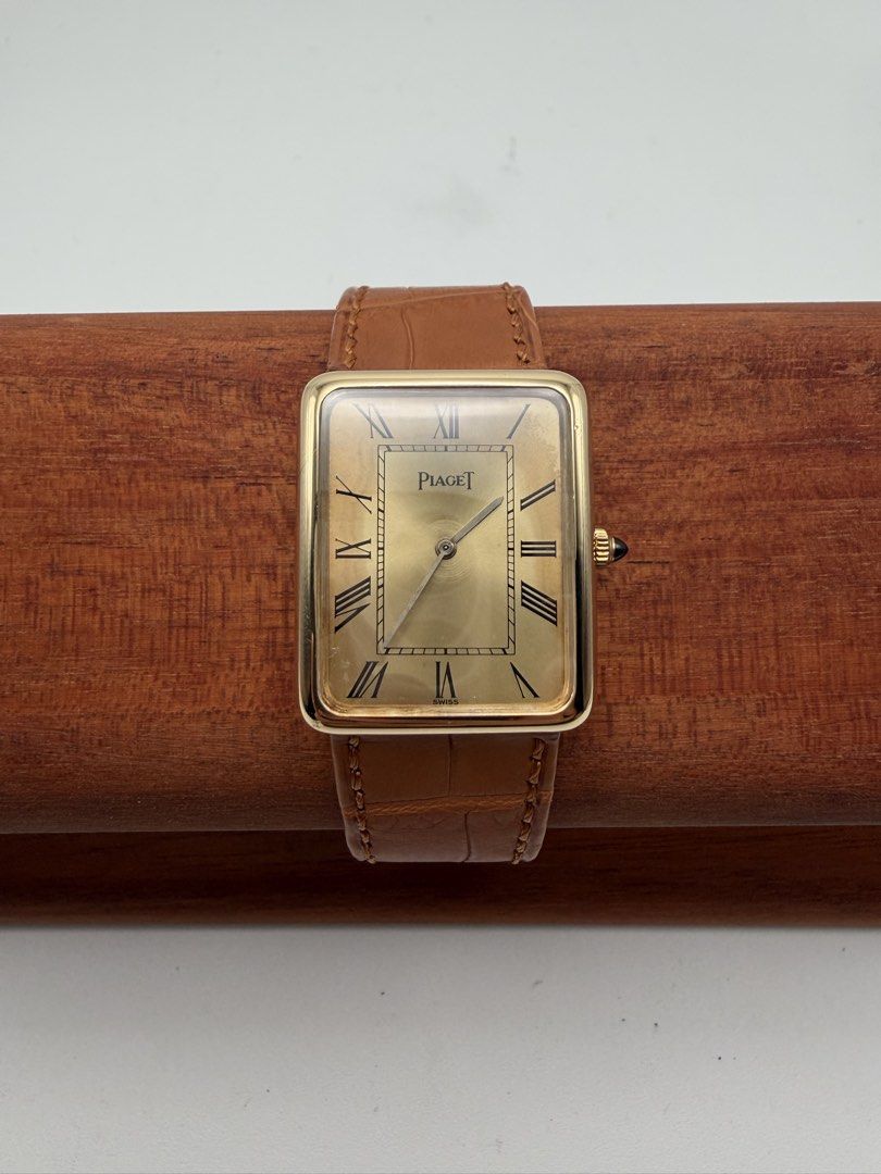 Vintage Piaget Tank Solid 18k Gold Manual Wind (Category: Luxury Watches) located in Manila. Submitted by rj_authenticwatchesandmore (Listing ID 1459656665, Image 2). Description: Vintage Piaget Tank - 1970s watch - Solid 18k Gold Case, including buckle - Cabochon crown - reference 9298 - weight of watch 30g (including strap) - case dimension 24mm x 30mm - manual wind movement In very good condition, some dial patina, runs good, keeps time Watch 