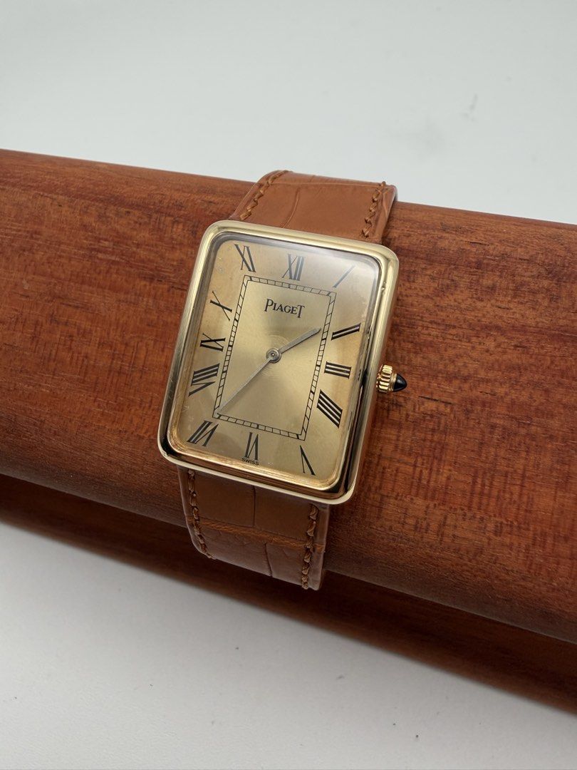 Vintage Piaget Tank Solid 18k Gold Manual Wind (Category: Luxury Watches) located in Manila. Submitted by rj_authenticwatchesandmore (Listing ID 1459656665, Image 3). Description: Vintage Piaget Tank - 1970s watch - Solid 18k Gold Case, including buckle - Cabochon crown - reference 9298 - weight of watch 30g (including strap) - case dimension 24mm x 30mm - manual wind movement In very good condition, some dial patina, runs good, keeps time Watch 