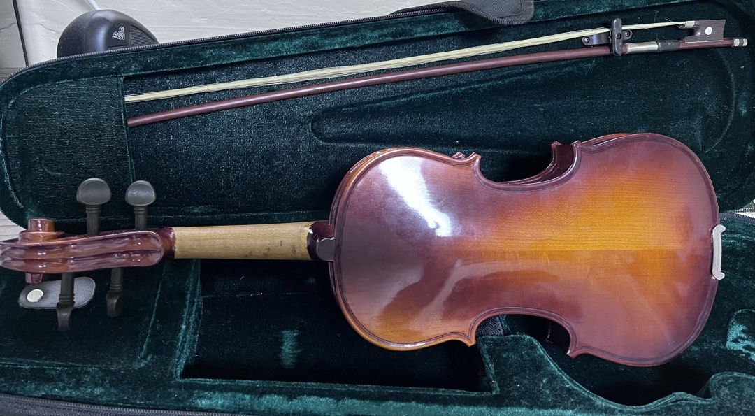 Violin (Category: Other Sports Equipment and Supplies) located in Las Pinas. Submitted by kanji.fashion (Listing ID 1459569317, Image 3). Description: Size: 1/4, Lenght: 18.5”, lightly used, with hard case included. Preloved item, need a bit cleaning & some flaws on hard case. .