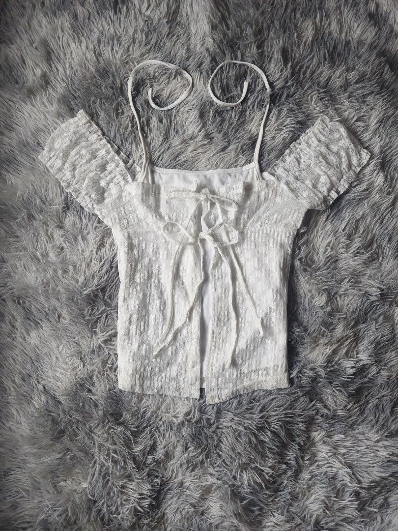 White Lace Cold Shoulder Tie Back Crop Top (Category: Blouses) located in General Trias. Submitted by shanicemau09687 (Listing ID 1459549955, Image 1). Description: Xs-S (bust: 31-34in, length: 20in) No brand (like-new condition).