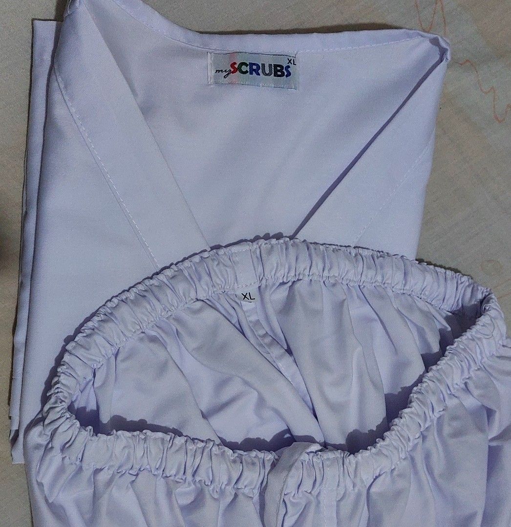 White Scrubs set XL (Category: Sets & Coordinates) located in Las Pinas. Submitted by ejmc2 (Listing ID 1459533278, Image 3). Description: SCRUBS Set 🎨: white 👖 length: 39.6 inches 👕 length: 29 armpit to armpit: 23 inches.