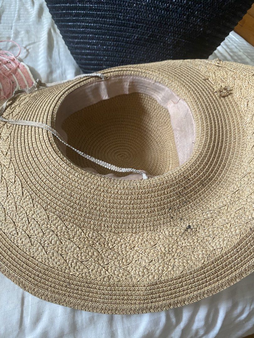 Wide Brim Straw Hat with Bow Detail (Category: Hats & Beanies) located in Santa Rosa. Submitted by intra_life4life (Listing ID 1459583282, Image 3). Description: - Classic straw hat with a wide brim for excellent sun protection. - Features a natural, woven texture for a chic look. - Adorned with a neutral-toned bow around the crown. - Ideal accessory for beach days, picnics, or everyday casual wear. - Lightweight and easy to pack for travel..