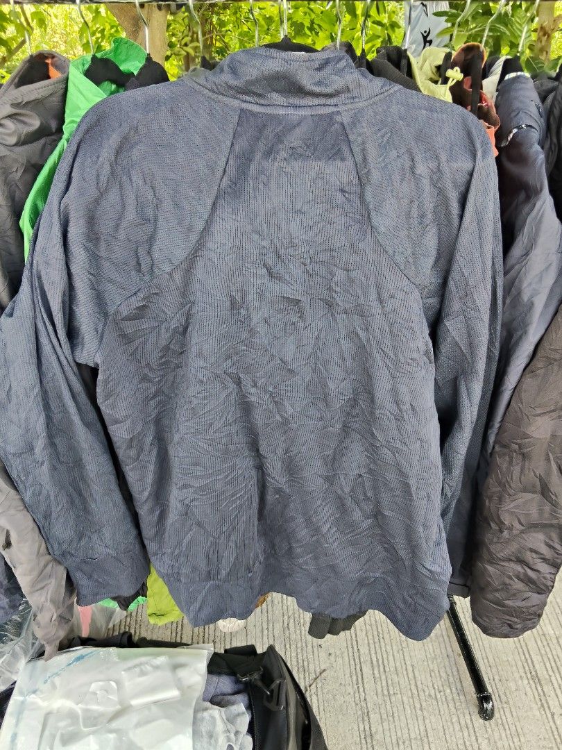 WIXARC Navy Blue Zip-Up Jacket (Category: Coats, Jackets and Outerwear) located in Manila. Submitted by whatthethrift696 (Listing ID 1459580881, Image 2). Description: - Navy blue WIXARC jacket - Full zip-up front - Lightweight, textured material - Long sleeves - Ideal for layering or casual wear - Easy to pack and carry.