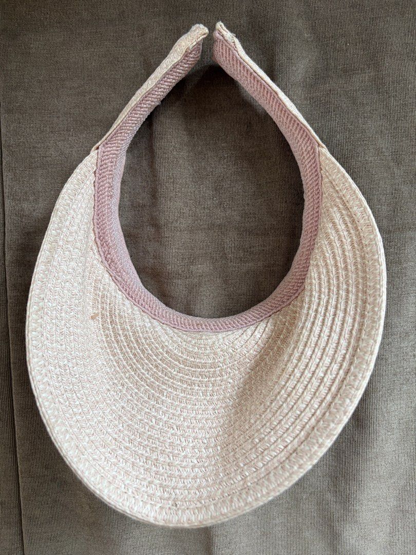 Woven Straw Visor Hat with Pink Trim (Category: Hats & Beanies) located in Taguig. Submitted by styledamsel (Listing ID 1459538733, Image 2). Description: - Lightweight straw material - Soft pink trim detail - Open top design for breathability - Ideal for sunny days and outdoor activities - Easy to pack and carry - Effectively shields your face from the sun Bought in the US for $14 .
