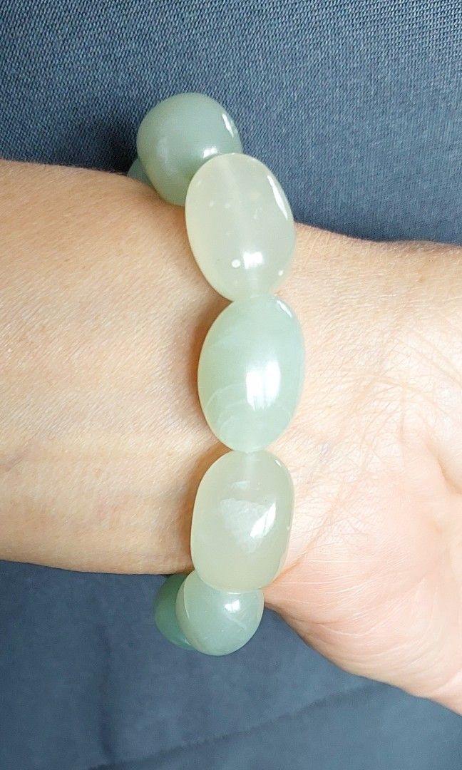 Xiuyu Jade Bracelet (Category: Bracelets) located in Gapan. Submitted by purseofjune (Listing ID 1459536567, Image 3). Description: 13mm beads, freeform customized wrist size.