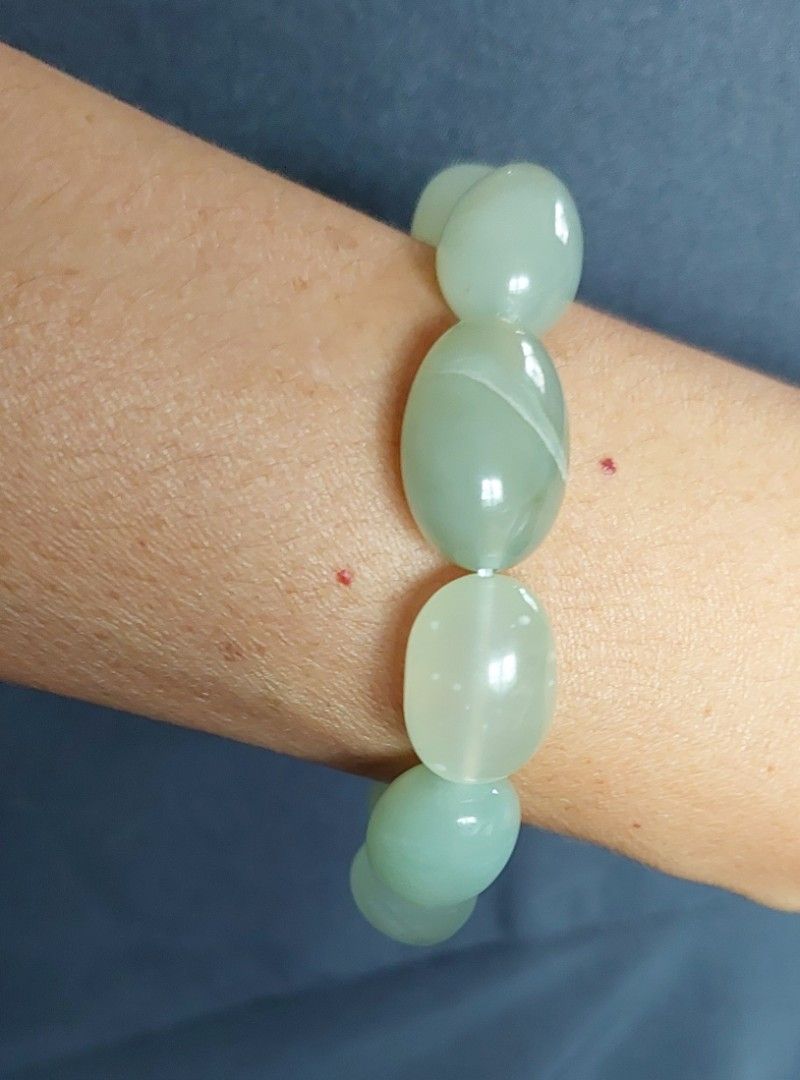 Xiuyu Jade Bracelet (Category: Bracelets) located in Gapan. Submitted by purseofjune (Listing ID 1459536567, Image 2). Description: 13mm beads, freeform customized wrist size.