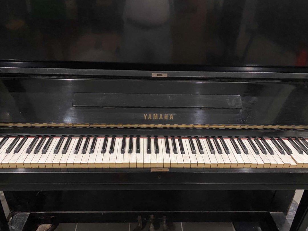 Yamaha Upright Acoustic Piano (Category: Musical Instruments) located in Taguig. Submitted by future.fits (Listing ID 1459523482, Image 1). Description: - Yamaha upright acoustic piano, made by Nippon Gakki - Keys and internal mechanisms are visible - Minor tuning required.