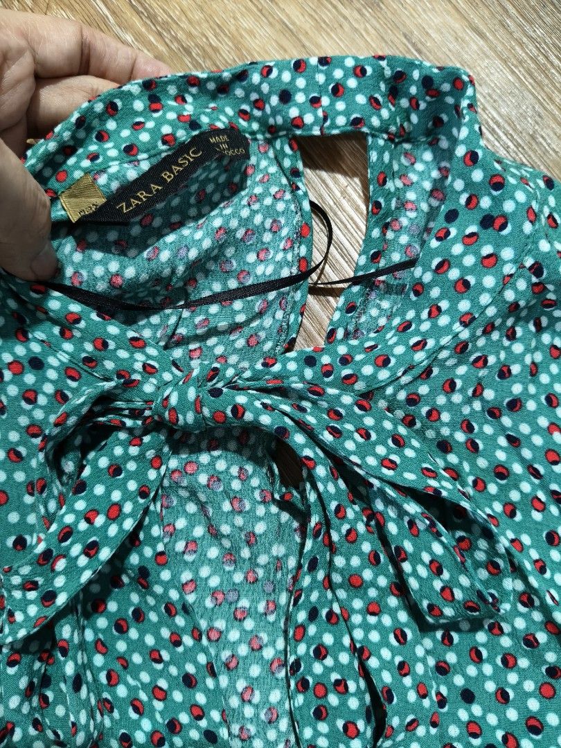Zara Basic Green Printed Blouse with Tie Neck (Category: Blouses) located in Tarlac. Submitted by momma02 (Listing ID 1459609909, Image 3). Description: - Green Zara basic blouse - Fun red and white polka dot print - Long sleeves - Tie-neck detail at the front - Can be tied up or left open - Made in Morocco - Size: EUR 36, USA S MEX 26.
