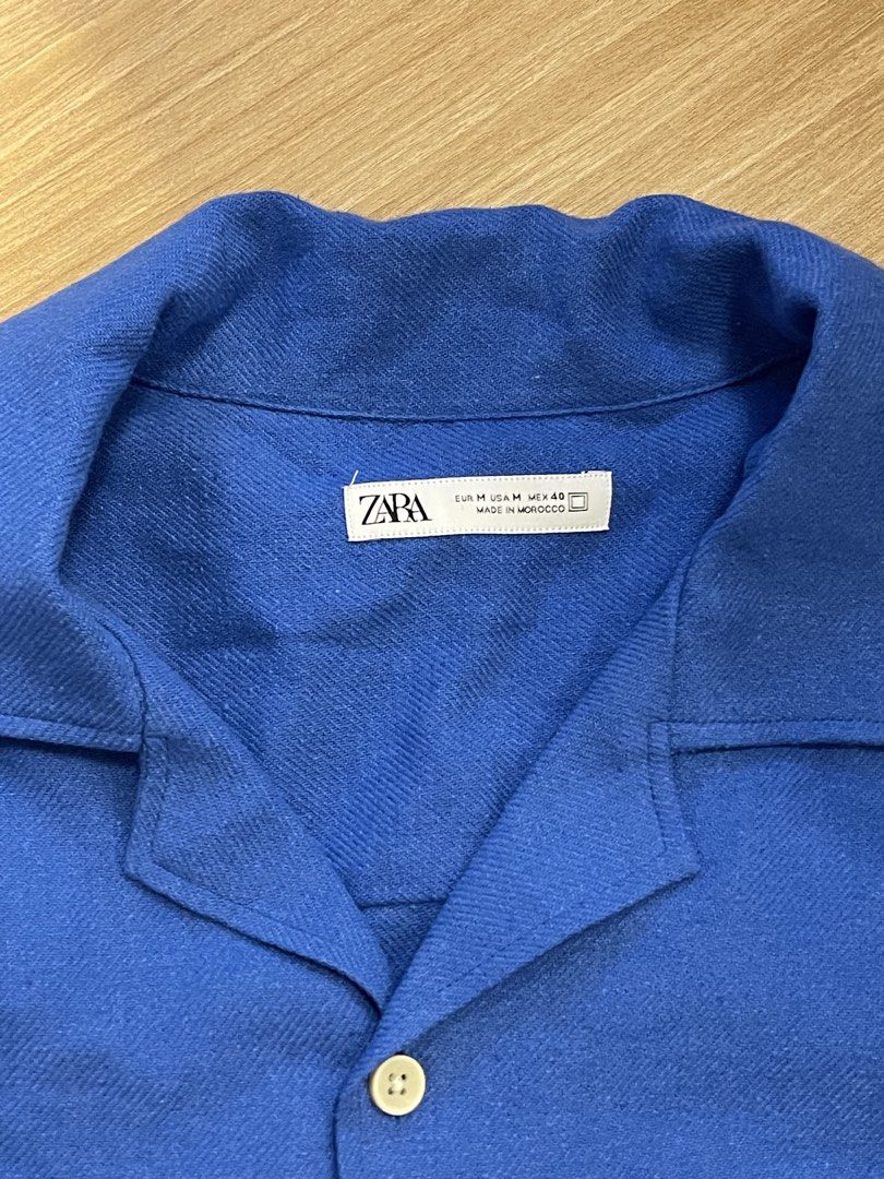 Zara Blue Short Sleeve Button Up Shirt (Category: Tshirts & Polo Shirts ) located in Taguig. Submitted by buymythingsty (Listing ID 1459606674, Image 3). Description: Decluttering.