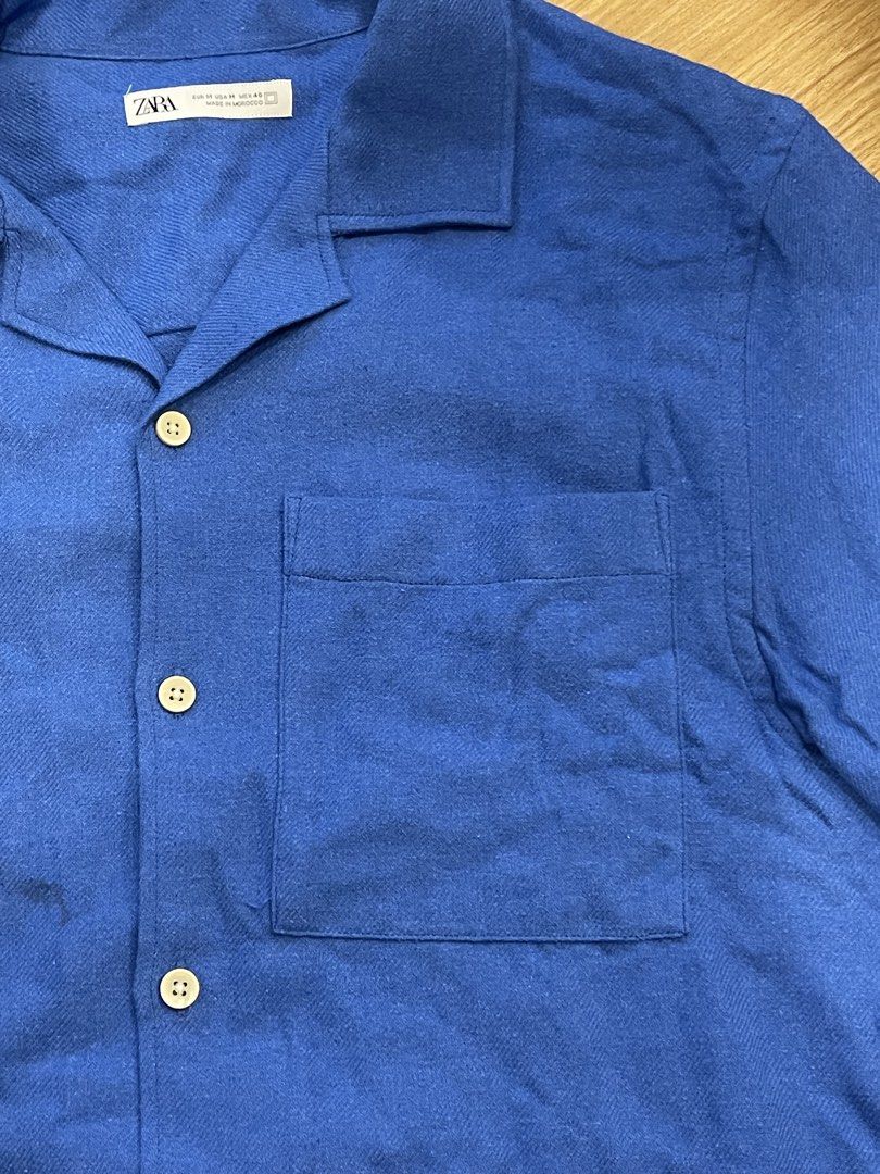 Zara Blue Short Sleeve Button Up Shirt (Category: Tshirts & Polo Shirts ) located in Taguig. Submitted by buymythingsty (Listing ID 1459606674, Image 2). Description: Decluttering.