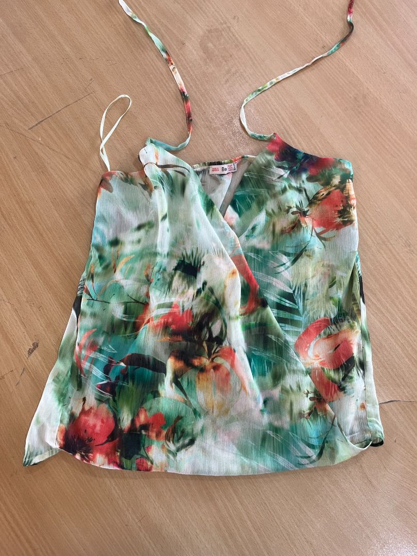 Zara Floral Top with Tie Straps (Category: Blouses) located in Caloocan City. Submitted by gohousehold (Listing ID 1459562596, Image 1). Description: Zara Floral Top with Tie Straps Price: ₱250 Brand: Zara Color: Floral Size: S Style: with Tie Straps Condition: Used lightly, no flaws Rsf: Decluttering clothes.
