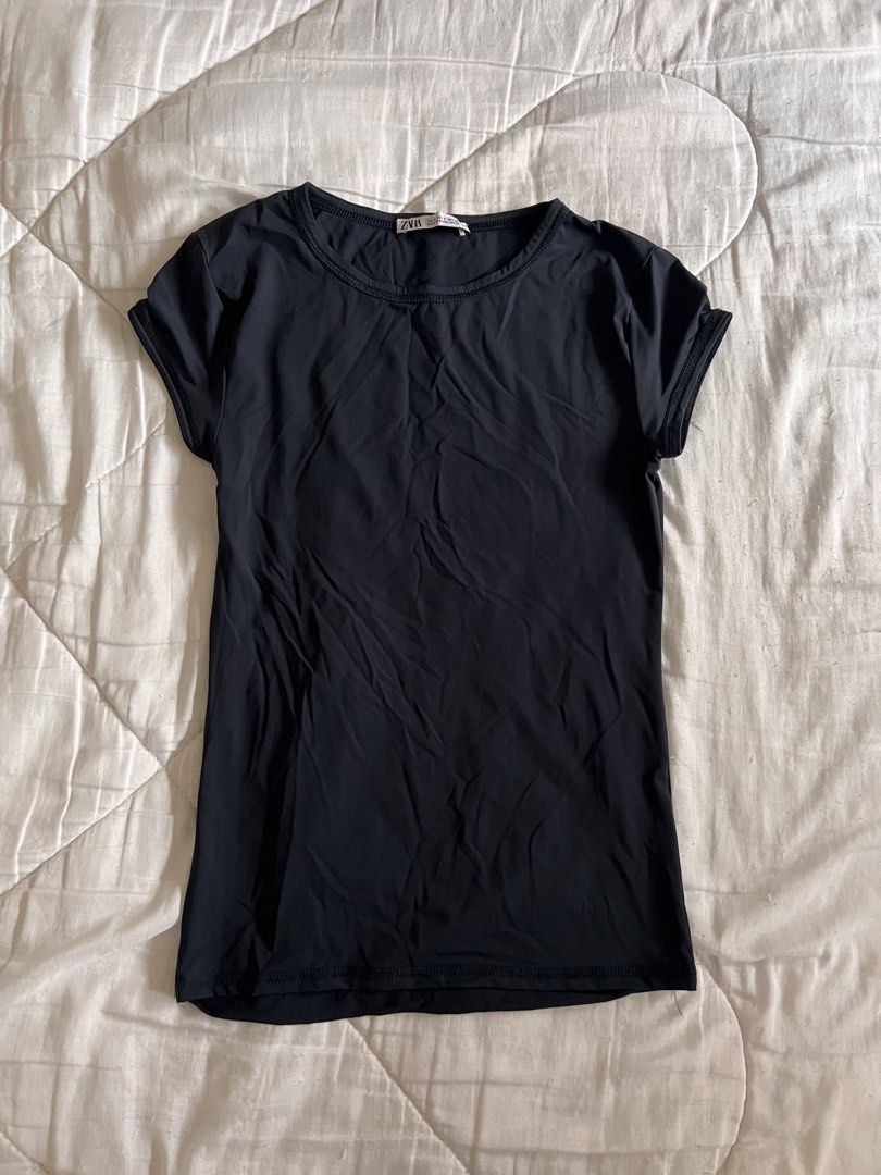 ZARA Navy Basic Tight Fitting Tee (Category: Shirts) located in Taguig. Submitted by gingerderp (Listing ID 1459586971, Image 1). Description: Hey there! 👋 Selling this classic navy crew neck tee from ZARA, perfect for your everyday OOTD! ✨ It's a size Small (EUR 36/UK 8/US 4) and super comfy to wear. This basic tee is a total wardrobe essential – easy to pair with anything from jeans to skirts. 😊 SUPER FLATTERING!! .
