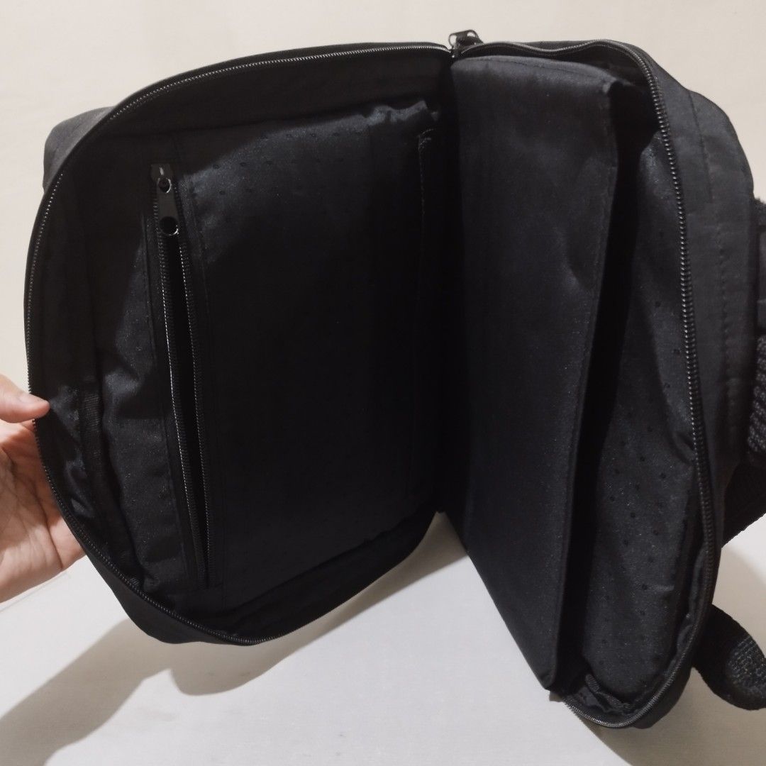 13-14" Black Laptop Bodybag (Category: Laptop Bags & Sleeves) located in Caloocan City. Submitted by love.aiden (Listing ID 1459866542, Image 2). Description: Classic black backpack. Features a main compartment, front zip pocket, and padded interior for a laptop. Adjustable straps. Perfect for daily use or travel..