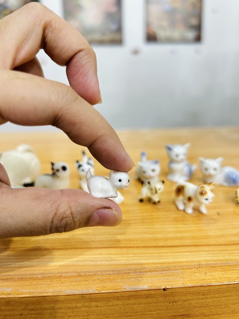 13pcs Miniature Ceramic Cat Figurines (Take All Only) ✨ (Category: Figurines & Statues) located in Bustos. Submitted by gthings.collectibles (Listing ID 1459734732, Image 2). Description: 13pcs Miniature Ceramic Cat Figurines (Take All Only) ✨ ₱450 only !! 🐈Sizes: Mix of 0.5 inches to 2 inches 🐈Material: Glazed ceramic / porcelain 🐈Note on condition: Honest issue, 1 cat has no tail. 🐈The rest are in good, displayed condition. 🐈Perfect for ho