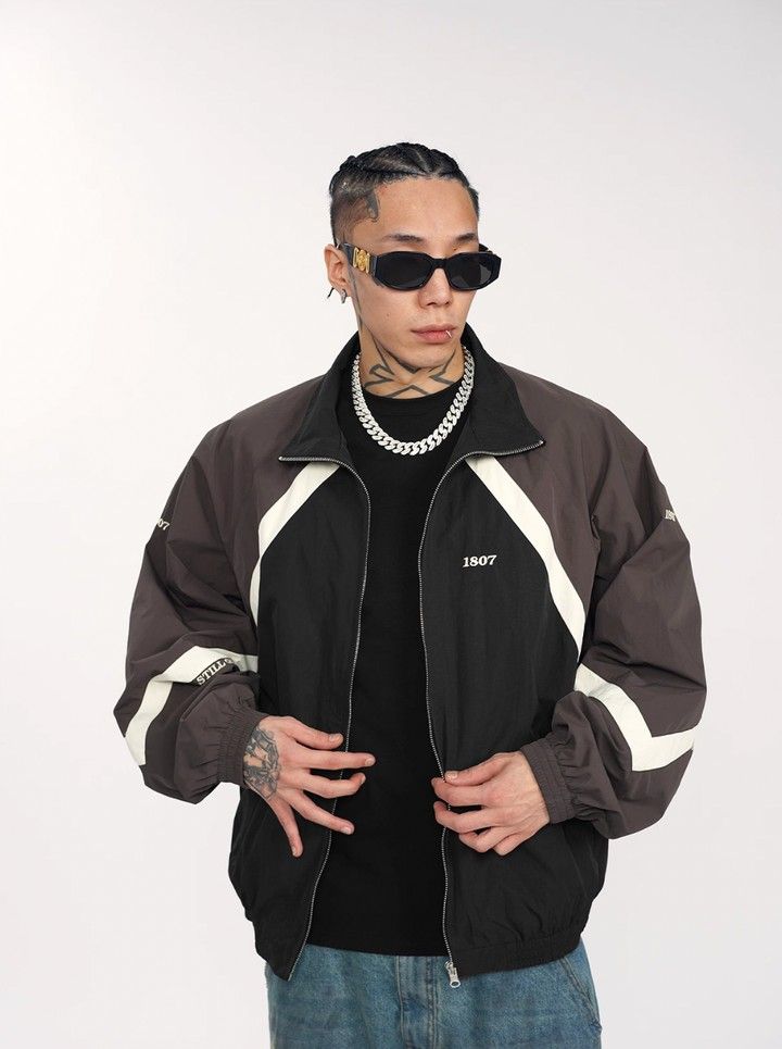 1807 Split Contrast Embroidery Nylon Track Jacket (Category: Coats, Jackets and Outerwear) located in Manila. Submitted by kenny200024 (Listing ID 1459734192, Image 1). Description: 1807 Split Contrast Embroidery Nylon Track Jacket - size medium - actual dimension width 27 | length 27 | Sleeve 31.5 - excellent condition - DM will send you other detail pics.