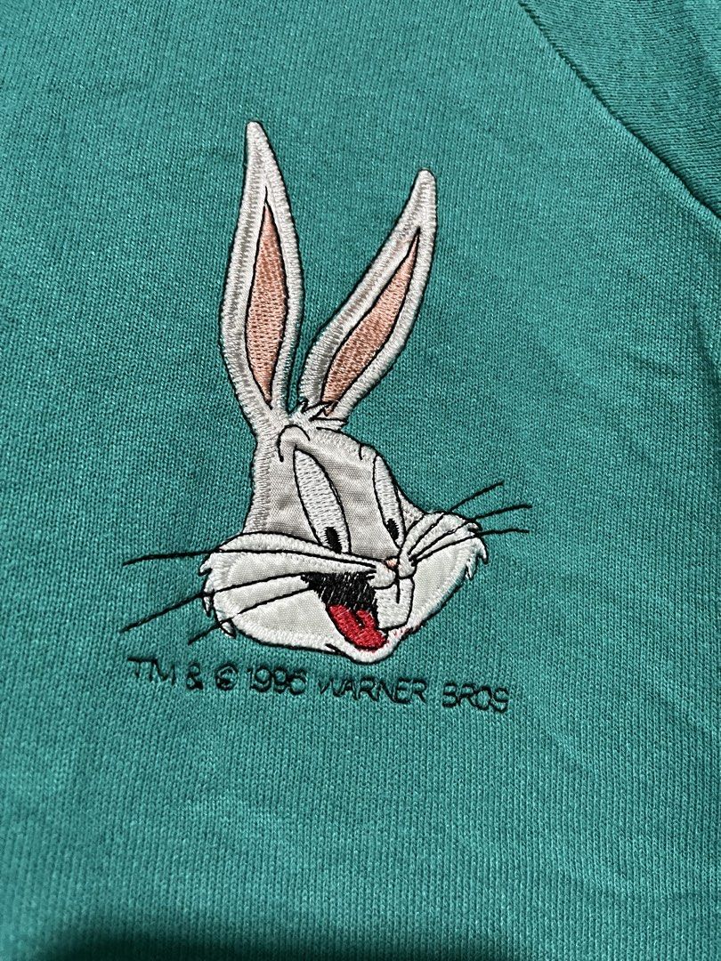 1996 Warner Bros. Bugs Bunny Embroidered Sweatshirt (Category: Longsleeves) located in Manila. Submitted by jhanzrose (Listing ID 1459693352, Image 1). Description: - Vintage Bugs Bunny Sweatshirt - Year: 1996 - Color: Teal Green - Features classic embroidered Bugs Bunny graphic - Warner Bros. copyright included - Ideal for Looney Tunes collectors and fans.