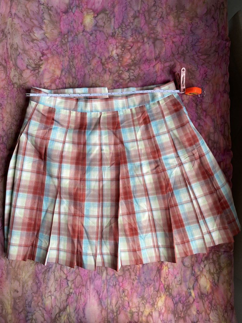 28 Plaid Pleated Mini Skirt (Category: Skirts) located in Pulupandan. Submitted by pointyspoon (Listing ID 1459736154, Image 1). Description: - Adorable plaid pleated mini skirt - Classic red, blue, and cream colorway - Features a flattering flare - Perfect for both casual and dressed-up occasions .