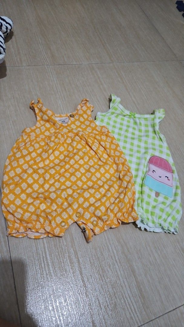 2 Baby Rompers - Ice Cream & Gingham Print (Category: Babies & Kids Fashion) located in Pasig City. Submitted by maja.1182 (Listing ID 1459822518, Image 1). Description: - Set of 2 cute baby rompers - Perfect for warm weather - Romper 1: Green gingham with ice cream applique - Romper 2: Yellow with white diamond pattern - Features ruffled sleeves - Convenient snap closures at the bottom - Made with soft, comfortable fabric for baby's skin.