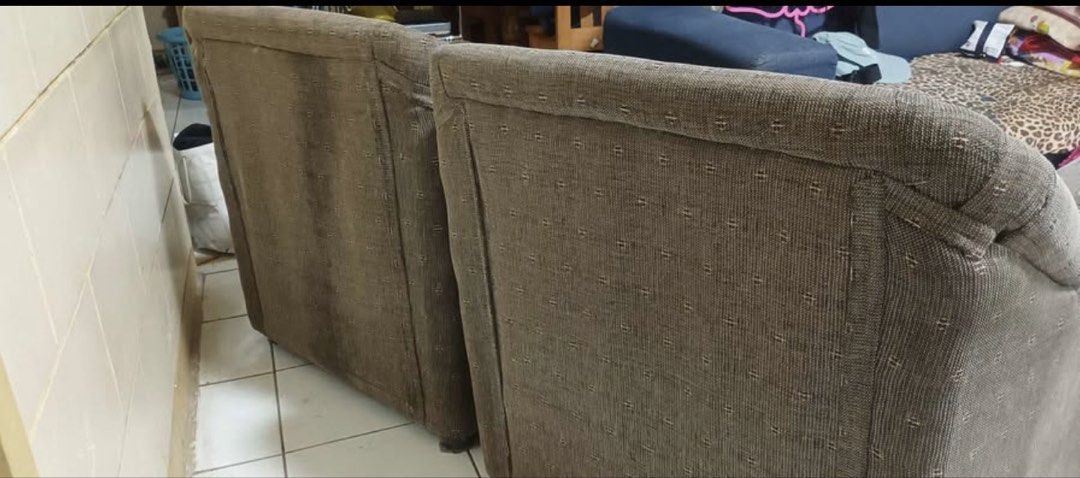 2-Seater Sofa and Armchair Set (Category: Sofas) located in Davao. Submitted by brightdragon-517292 (Listing ID 1459822966, Image 3). Description: - Comfortable 2-seater sofa and matching armchair set. - Upholstered in durable, patterned fabric. - Some stains present on the seats and one armchair. - Perfect for a living room or study space..