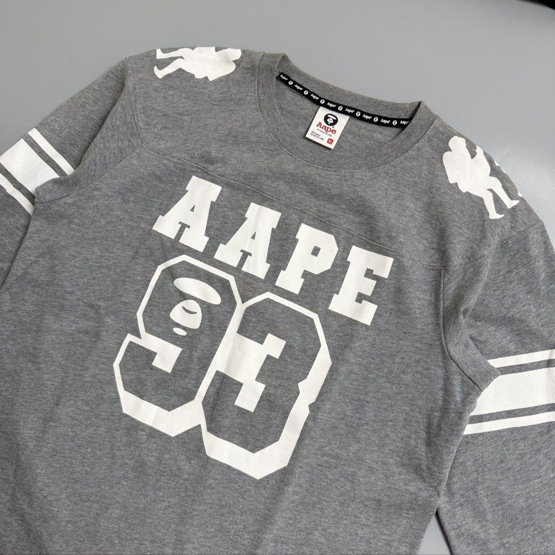 Aape by A Bathing Ape Rugby style sweater (Category: Coats, Jackets and Outerwear) located in Cebu City. Submitted by inukaybyjlf (Listing ID 1459699935, Image 2). Description: Condition: Good as new Issue: No flaws Dimension: Nasa photos Best fit: L-XL Please refer to photos for actual condition..