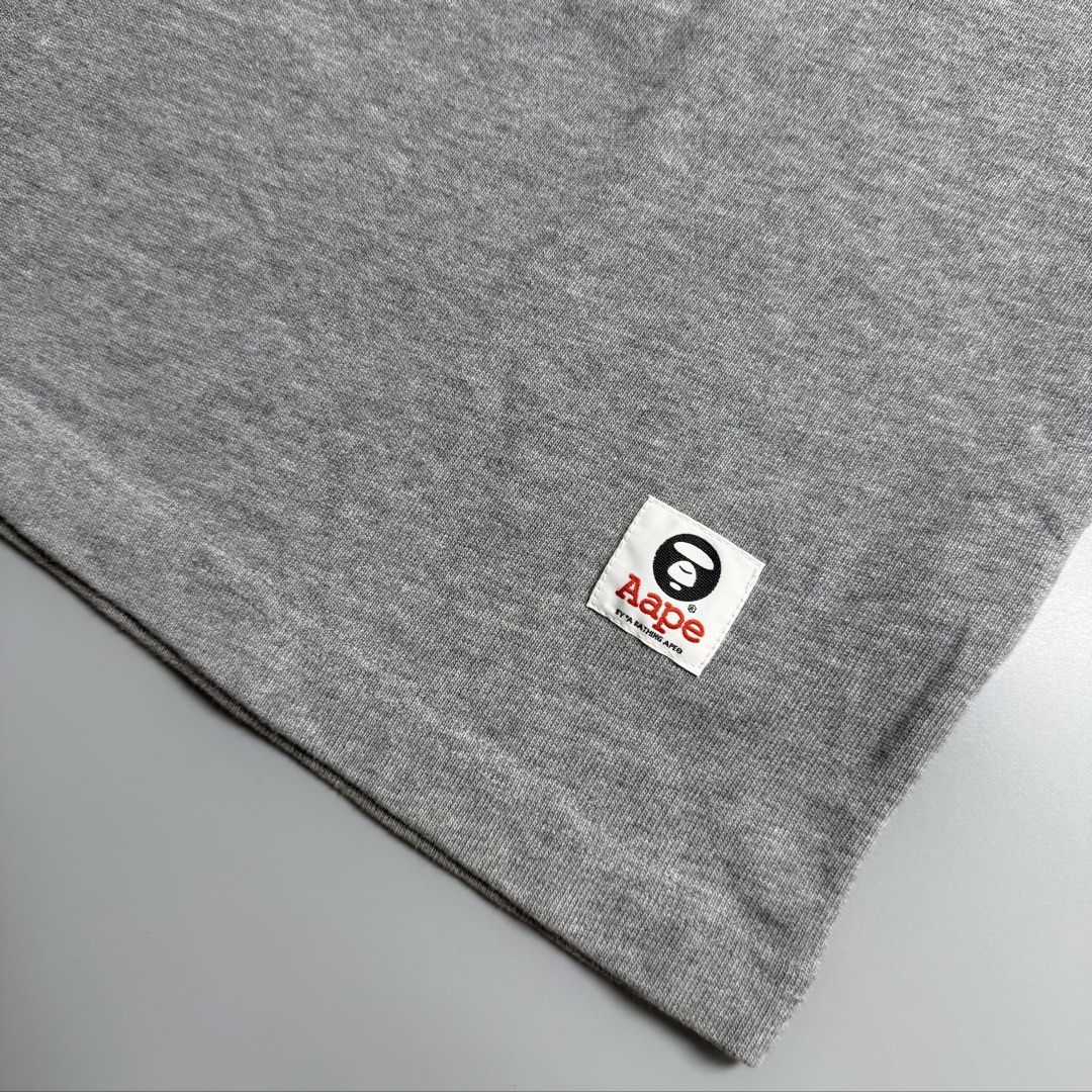 Aape by A Bathing Ape Rugby style sweater (Category: Coats, Jackets and Outerwear) located in Cebu City. Submitted by inukaybyjlf (Listing ID 1459699935, Image 3). Description: Condition: Good as new Issue: No flaws Dimension: Nasa photos Best fit: L-XL Please refer to photos for actual condition..