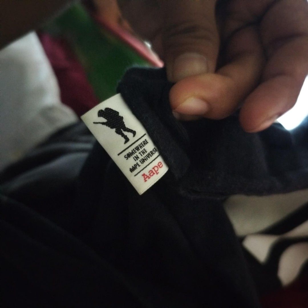 Aape tank top (Category: Tshirts & Polo Shirts ) located in Naga. Submitted by just_thrift2.0 (Listing ID 1459828344, Image 3). Description: large dimes 22x33 very good condition color rate 9.8/10 issue: minimal crack print / hindi masyadong visible.