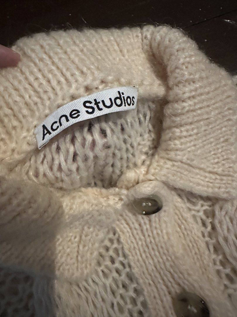 Acne Studios Sweater (Category: Longsleeves) located in Quezon City. Submitted by bernicet31 (Listing ID 1459732709, Image 2). Description: - Acne Studios cream knit sweater - Collared neckline with button closure - Intricate cable knit detailing - Loose, open knit construction - Ideal for layering.