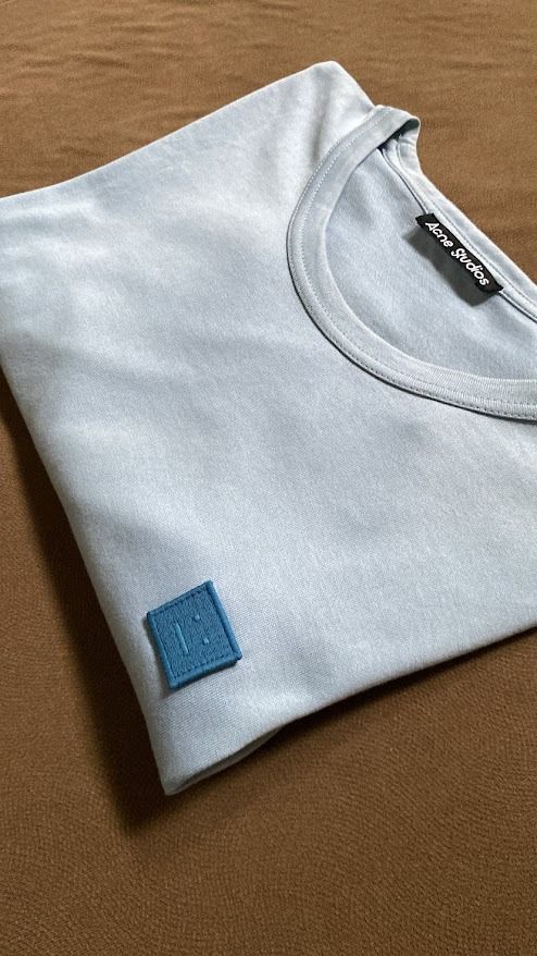Acne Studios Tee (Category: Tshirts & Polo Shirts ) located in Quezon City. Submitted by maeee_99 (Listing ID 1459794179, Image 2). Description: - Authentic - 21 x 28 - Powder Blue - No issues.