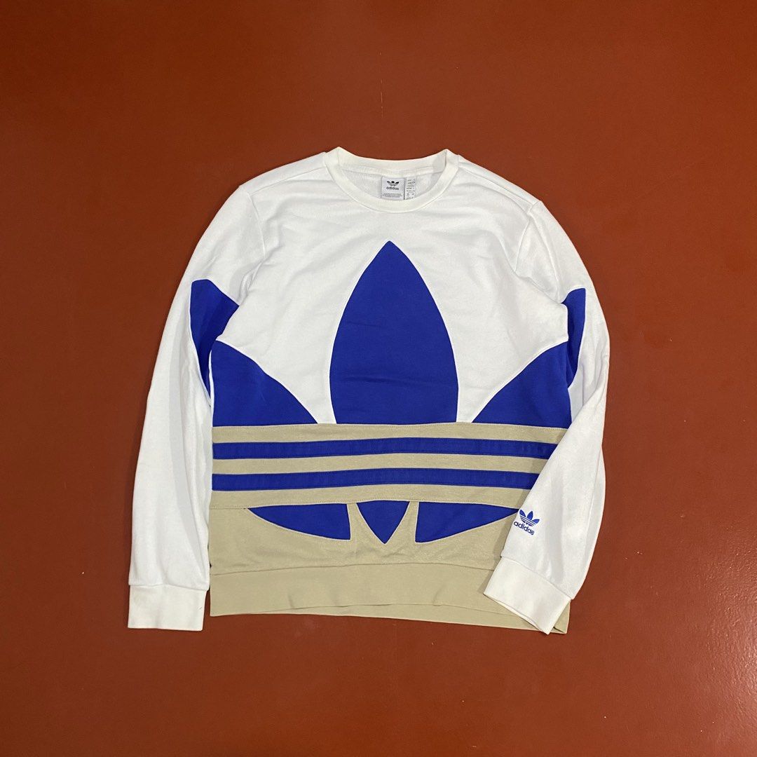 ADIDAS BIG TREFOIL PULLOVER (Category: Coats, Jackets and Outerwear) located in Pasig City. Submitted by buzzthrifty (Listing ID 1459828673, Image 1). Description: SIZE M-L 20x24.5 EXCELLENT TO NEW .