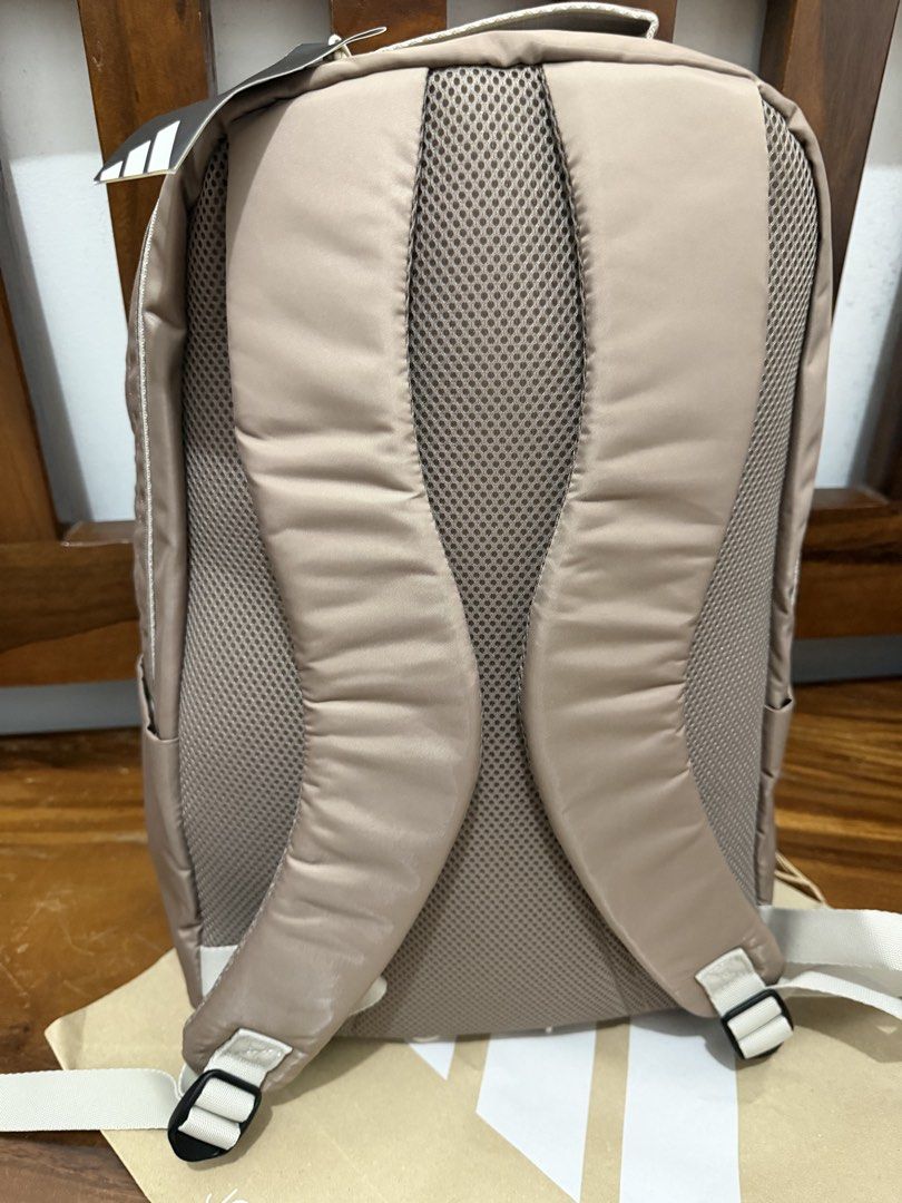 Adidas BP Backpack - Taupe (Category: Backpacks) located in Makati City. Submitted by petite_preloved2 (Listing ID 1459793240, Image 2). Description: - Can fit 16” laptop - Brand new Adidas backpack - Stylish taupe color - Main compartment for storage - Convenient front pocket - Padded straps for maximum comfort - Original tags still attached.