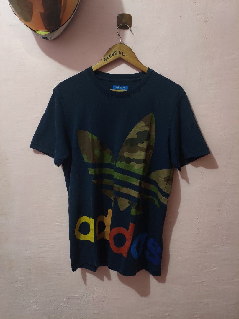 Adidas Camo Biglogo Shirt (Category: Tshirts & Polo Shirts ) located in Paranaque City. Submitted by glendel_04 (Listing ID 1459845213, Image 1). Description: Good cond 9.5-9.8 Med - Large Laundry ✅.