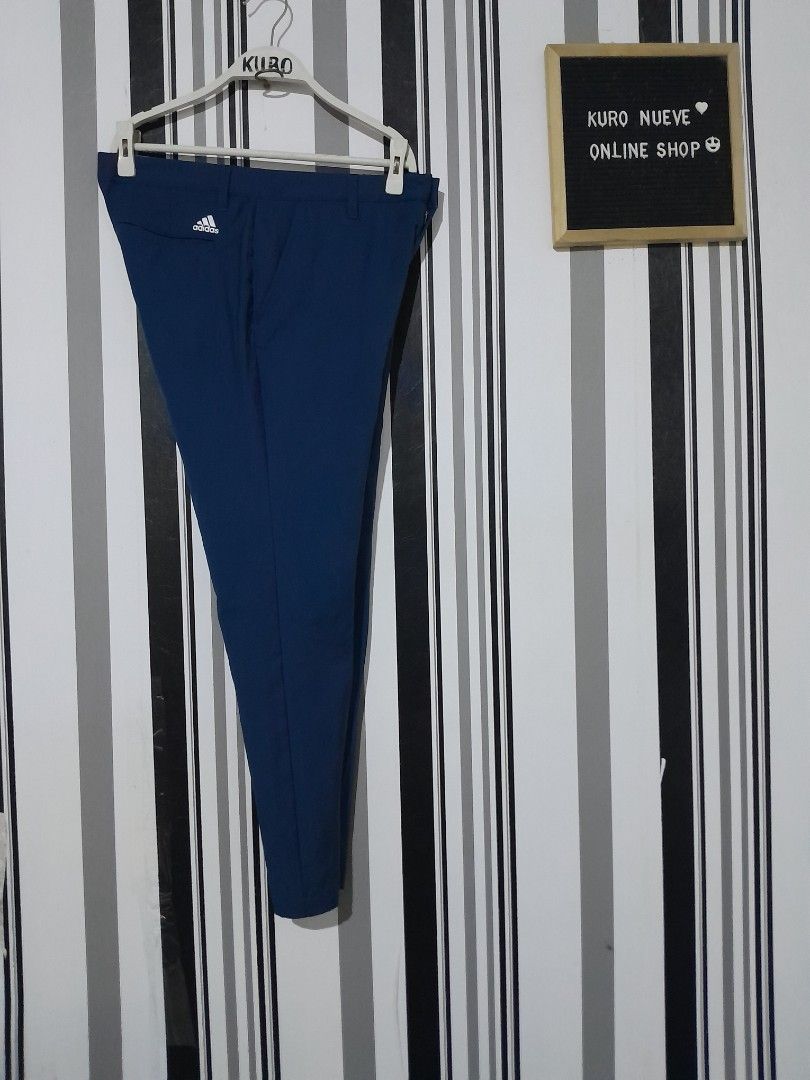 Adidasgolf pants ⛳️ (Category: Chinos) located in Lucena. Submitted by kuronueve0909 (Listing ID 1459806102, Image 2). Description: Adidasgolf Waistband Size: 32 to 34 Length: 38 Leg opening:7 Color: navy blue Price: ₱1,750 No issue ✅️ Ready to wear ✅️ Dm 📩.