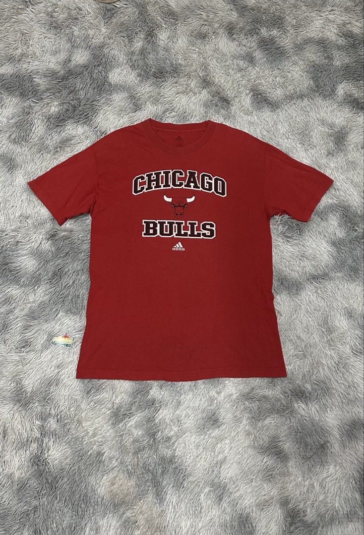 Adid*s x chicago bulls tee (Category: Tshirts & Polo Shirts ) located in Manila. Submitted by paulovenegaskalakal2020 (Listing ID 1459764633, Image 1). Description: For sale! Kalakal Ad*das x Chicago bulls tee 2000's adidas official merch printed tag Large- 21 width x 30.5 length inches Good fade Crack prints Stain & pinholes Sign of usage Good MINE 899 +sf.