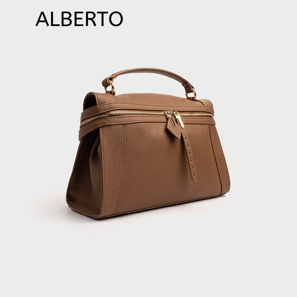 Alberto Brown Leather Top Handle Bag (Category: Shoulder Bags) located in San Fernando. Submitted by ozanneono (Listing ID 1459744360, Image 1). Description: Alberto Brown Leather Top Handle Bag. Textured leather. Zip top closure. Top handle. Versatile style..