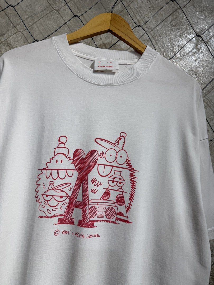 Ami x Kevin Lyons White Tee. (Category: Tshirts & Polo Shirts ) located in Manila. Submitted by ardobe.mnl (Listing ID 1459841209, Image 2). Description: -Ami x Kevin Lyons White Tee. Size: Large-XL Dimes: 23x28.5 Condition: Excellent Flaw: None! Mine: Dm for inquiries! 🛒📥.