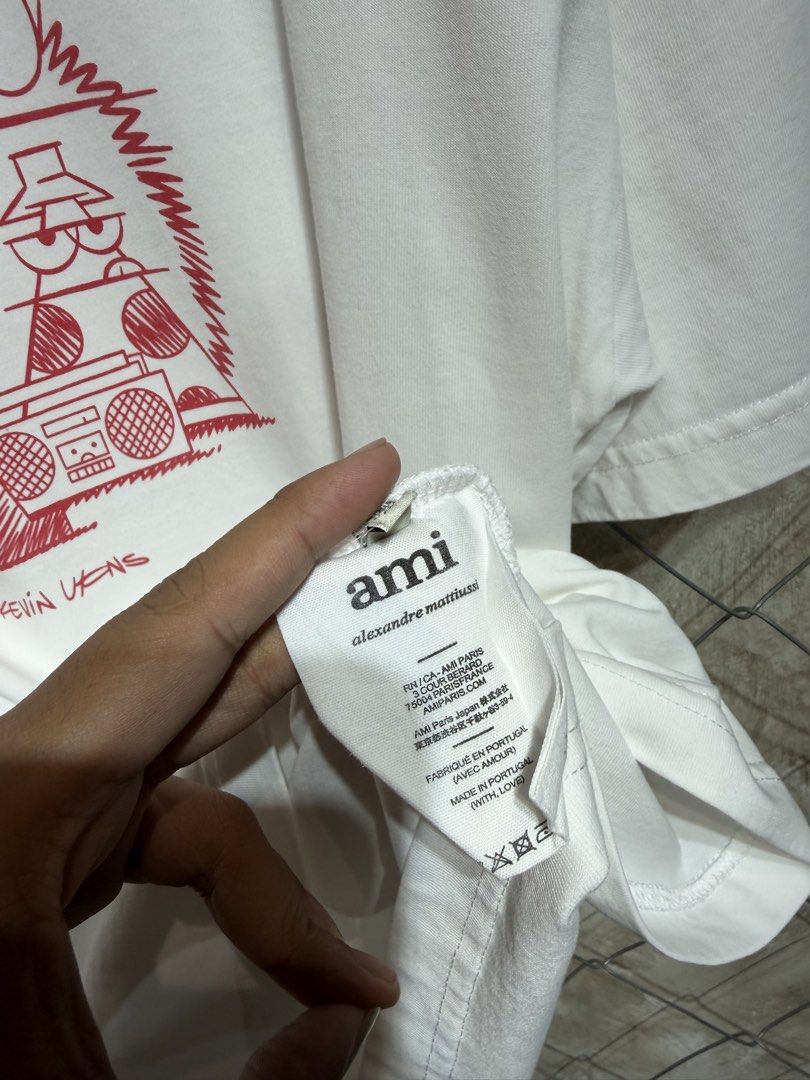 Ami x Kevin Lyons White Tee. (Category: Tshirts & Polo Shirts ) located in Manila. Submitted by ardobe.mnl (Listing ID 1459841209, Image 3). Description: -Ami x Kevin Lyons White Tee. Size: Large-XL Dimes: 23x28.5 Condition: Excellent Flaw: None! Mine: Dm for inquiries! 🛒📥.