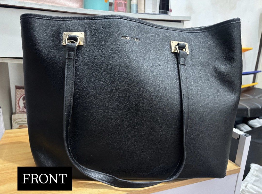 Anne Klein Tote Bag (Category: Tote Bags) located in Manila. Submitted by jenshiii11 (Listing ID 1459819976, Image 2). Description: Anne Klein Tote Bag *Slightly Used *Authentic AK *Bought personally in US *konting linis lang because nakatambak lang talaga. RFS: nakatambak lang, di nagagamit PAYO!! Shipping: JNT/lalamove Location: Dasmariñas, Cavite .