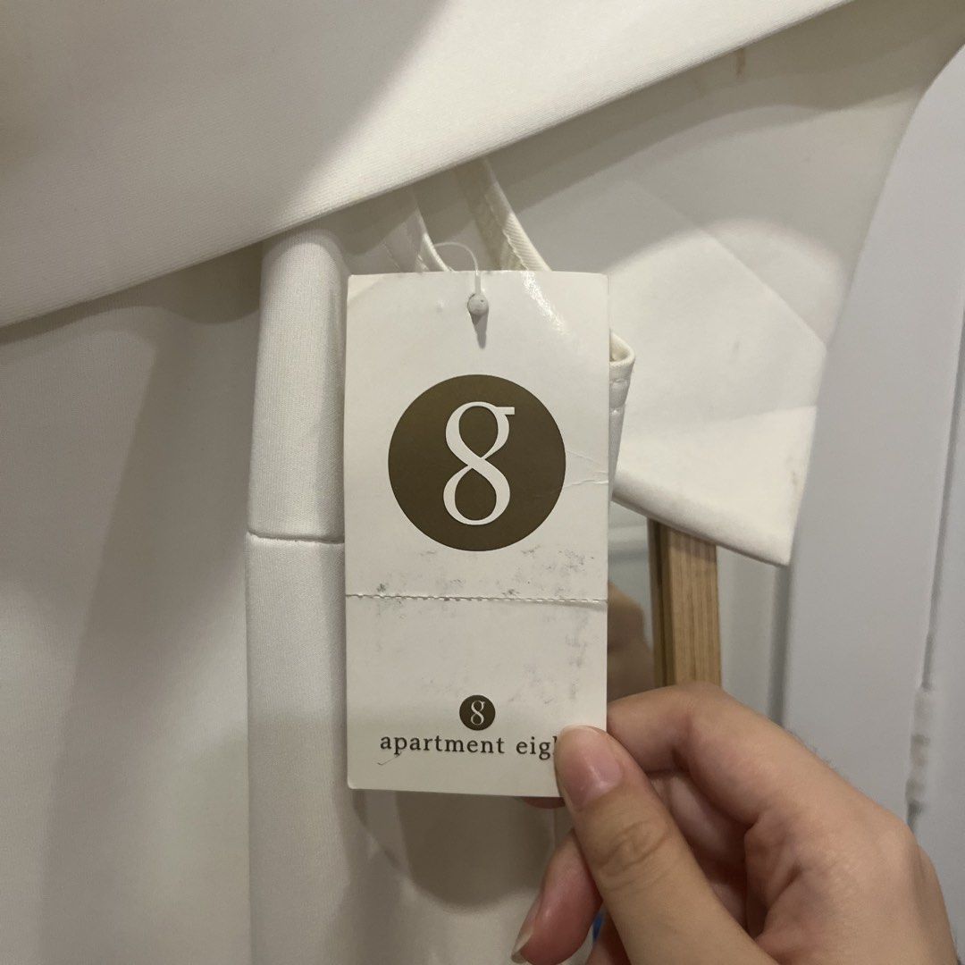 Apartment 8 Chanel Dress White Medium (Category: Dresses) located in Paranaque City. Submitted by kalattt (Listing ID 1459763359, Image 2). Description: - Brand: Apartment 8 - Type: White Midi Dress - Size: Medium - Features: Wide collar, flared skirt - Extras: Original tags still attached.