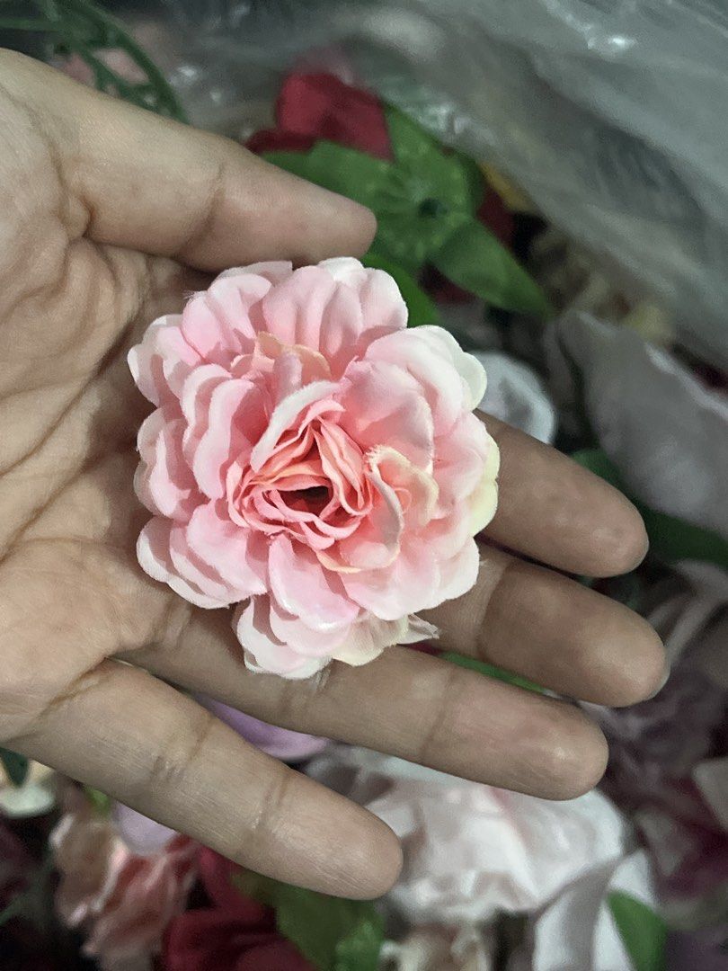 Assorted Artificial Flowers for Crafts and Decorations (Category: Artificial Plants & Flowers) located in Quezon City. Submitted by charlenedv58782 (Listing ID 1459733402, Image 3). Description: - Bundle of artificial flowers in various colors: pink, burgundy, yellow, and white. - Ideal for DIY projects, floral arrangements, and party decorations. - Features a mix of blooms including roses, peonies, and other flower types. - Some flowers come wit