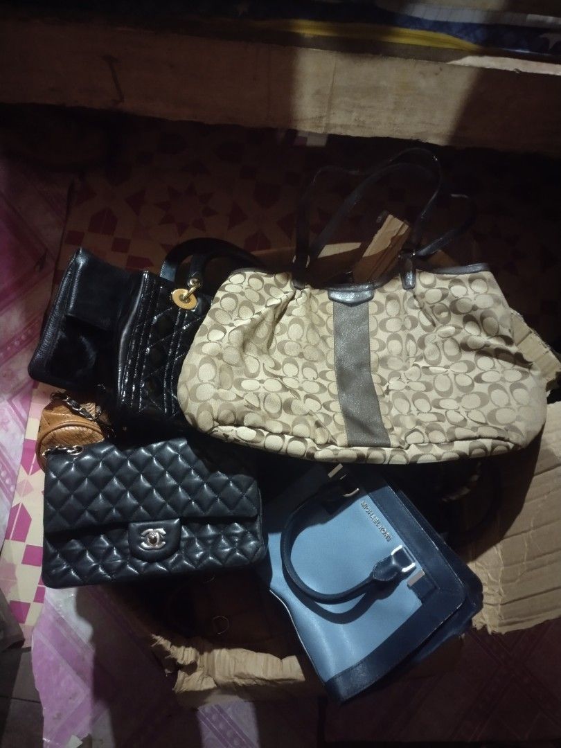 Assorted Designer Handbags - Coach, Chanel, Michael Kors (Category: Luxury Bags & Wallets) located in Valencia. Submitted by coolwolf_27a64f (Listing ID 1459809352, Image 1). Description: 20pcs all branded bag - Bundle of 4 designer-style handbags - Includes a large Coach tote with signature print - Black quilted Chanel-style flap bag - Black patent leather Dior-style bag - Blue Michael Kors tote bag - A great collection for any handbag lover.