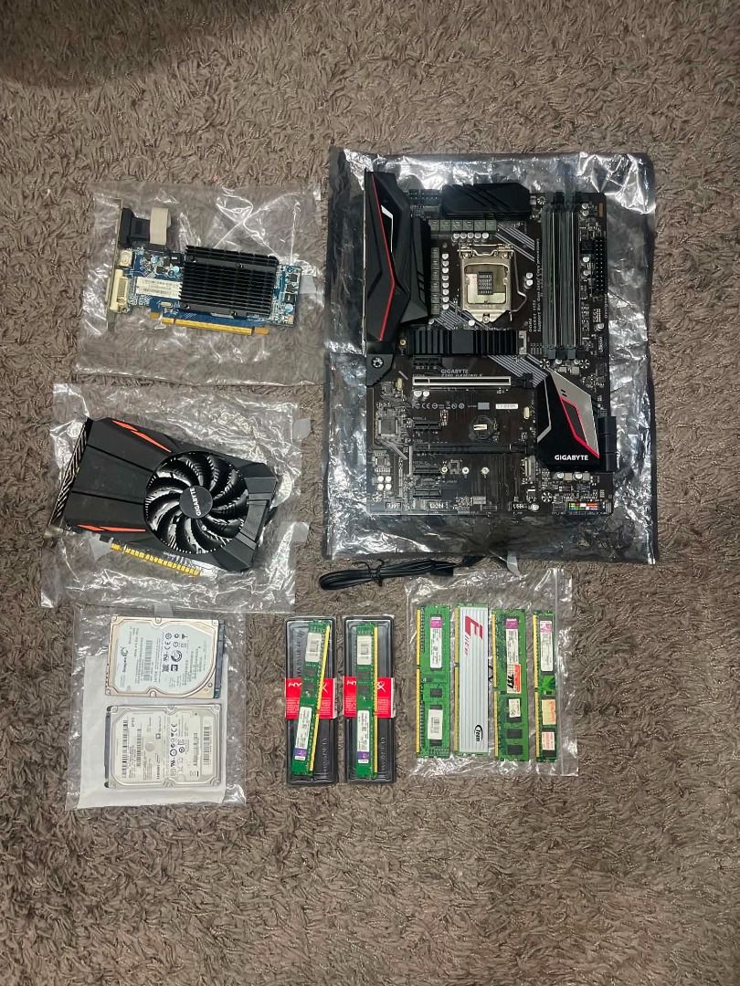 Assorted PC Parts (used and defective) (Category: Computer Parts) located in Manila. Submitted by brotheralbert (Listing ID 1459770281, Image 1). Description: Motherboard 1,000 Gigabyte Z390 gaming X 8-9th gen board kinukulang na ata ng kuha ng power. (with video last test) DDR3 RAM 1,200 Kingston 2x2gb 1333mhz KVR1333D3S89/2G (99U5474) parang lpx- nagamit pa and gumana last check. 2gb 1333mhz - KVR1333D3S8N9/2G (990405402) tagal na din nagamit a