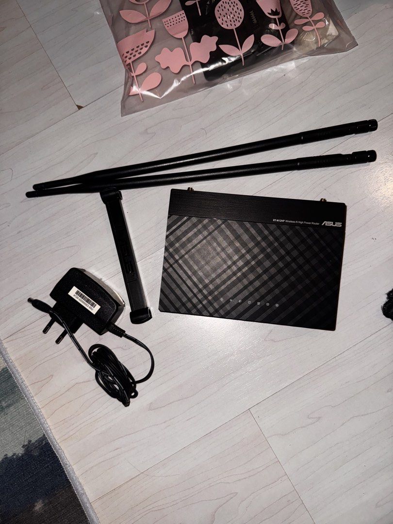 Asus Router RT-N12HP (Category: Networking) located in Antipolo. Submitted by marian_ang (Listing ID 1459810143, Image 1). Description: SRP: ₱ 2010 RFS: We have new routers :)) SF: Shouldered by buyer :)).