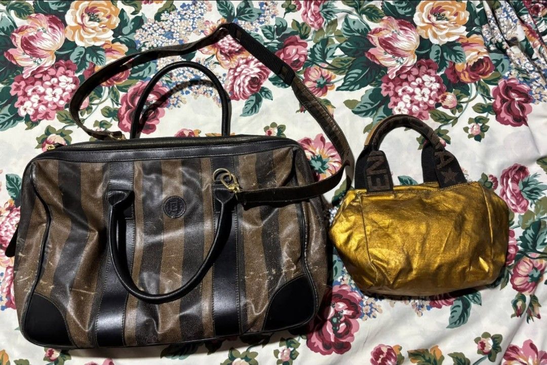 Authentic Fendi Zucca Pattern Boston Bag and Mini Bag Set (Category: Luxury Bags & Wallets) located in Marikina City. Submitted by aussiemaan (Listing ID 1459705949, Image 1). Description: - Authentic Vintage Fendi Boston Bag - Classic Zucca Monogram Pattern - Comes with a matching metallic gold mini bag - Larger bag features a detachable shoulder strap - Ideal for Fendi enthusiasts and collectors.
