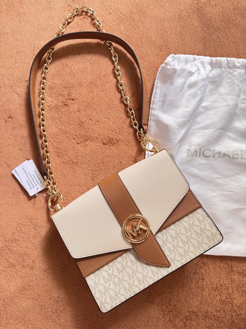 Authentic Michael Kors Sling Bag (Category: Cross-body Bags) located in Pasig City. Submitted by teyron (Listing ID 1459711179, Image 1). Description: Authentic Michael Kors Brandnew bought in Milan. PM if interested.