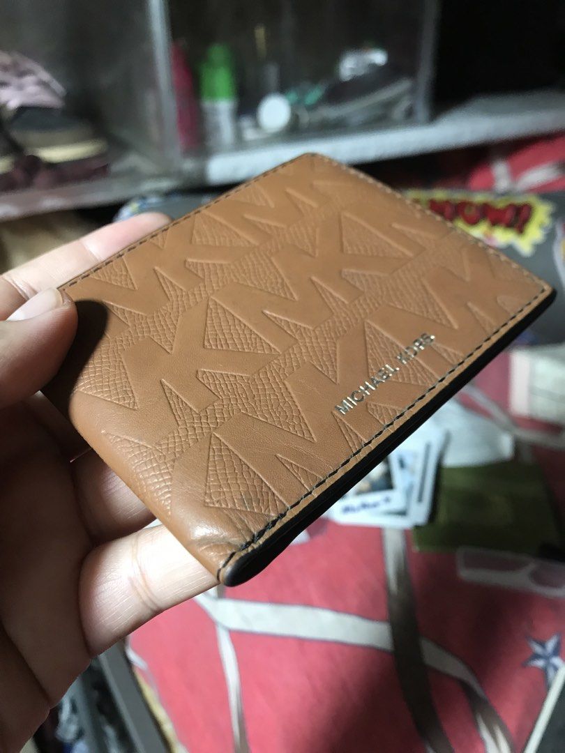 Authentic Michael Kors Wallet (Category: Luxury Bags & Wallets) located in Quezon City. Submitted by rare_findsxx (Listing ID 1459788093, Image 3). Description: Used but not abused bought in 🇺🇸 wallet for men Made in India 📍Cubao Quezon City can do lalamove.