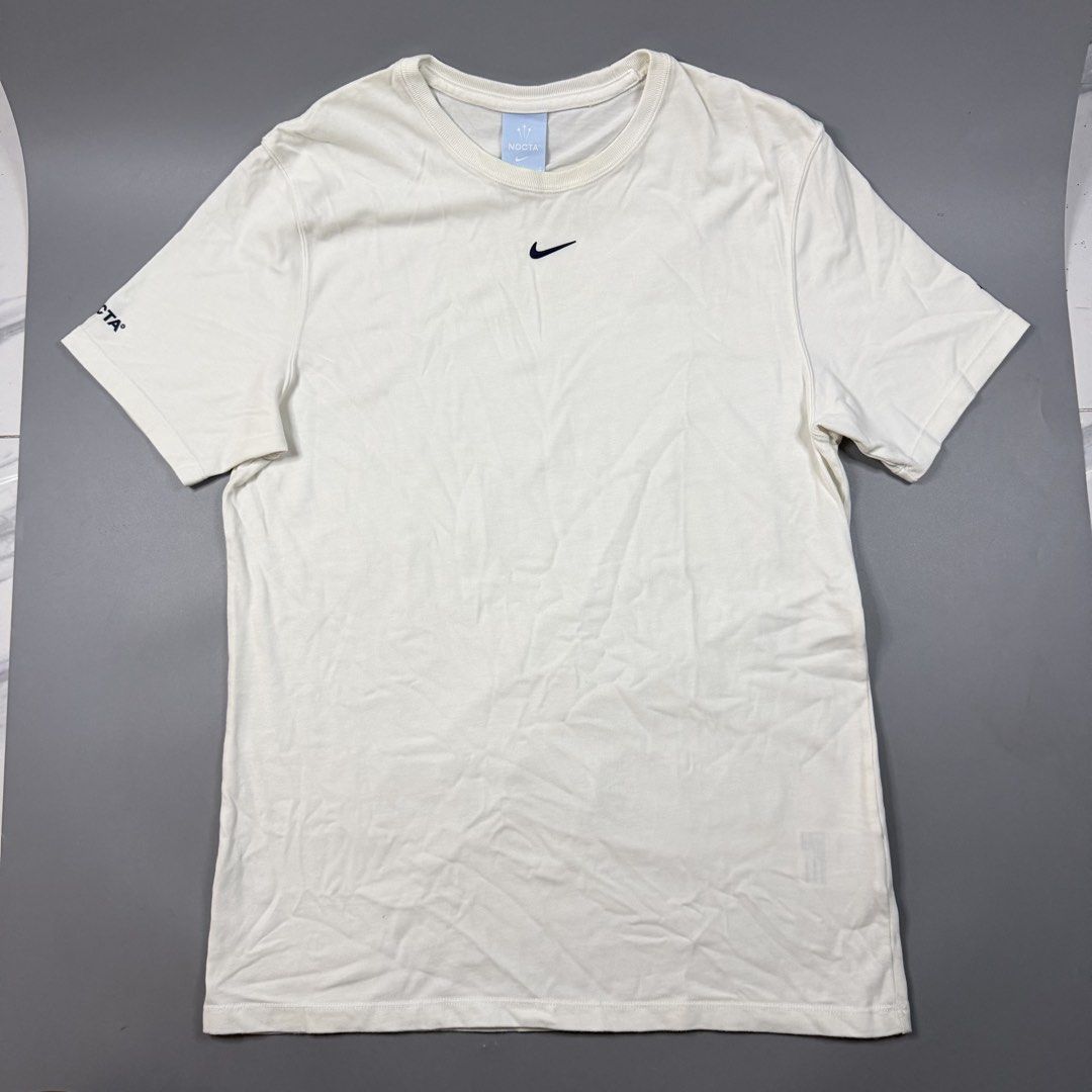 (Authentic) Nike - Nocta Drake Shirt (Category: Tshirts & Polo Shirts ) located in Paranaque City. Submitted by millennial_goodz (Listing ID 1459871653, Image 1). Description: WTS (Authentic) Nike - Nocta Drake Shirt Size Large Dimensions: 19.5" / 27.5" Excellent condition Needs iron only DM.