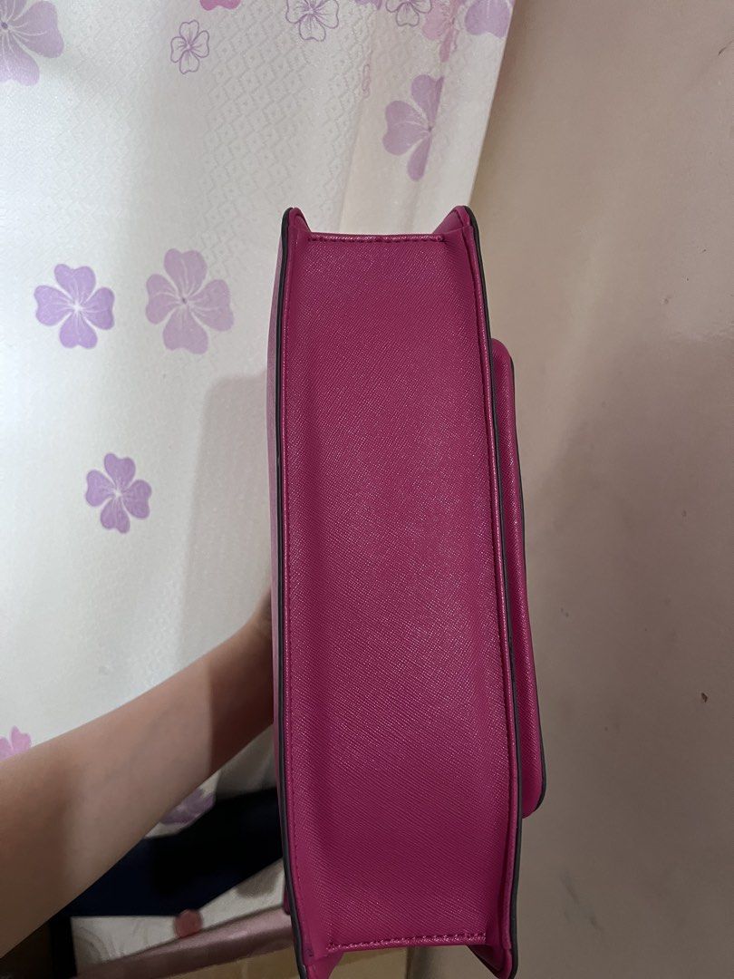 Authentic Nine West Pink Two Way Bag (Category: Shoulder Bags) located in Manila. Submitted by ot7purple (Listing ID 1459739725, Image 3). Description: - Authentic Nine West Two Way Bag - Adjustable strap, can be worn as a shoulder bag or crossbody - Original dust bag included - Clean inside and out, only call out is the minimal crack on the flap sides, otherwise excellent. ***Shipping fee not included. 📲IG: sofiajeneve.